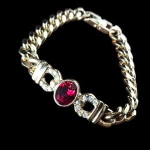 80s style chunky gold-tone curb chain bracelet, faux ruby accent